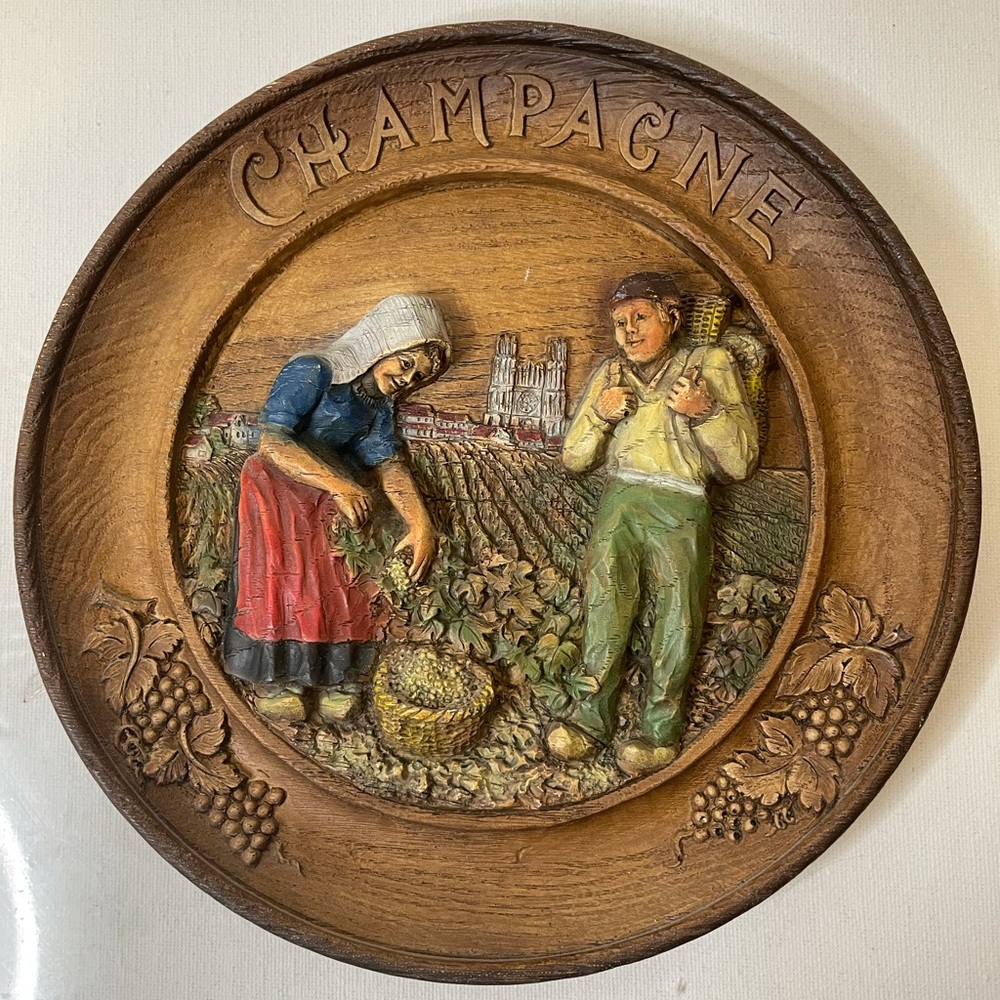 Vintage hand curved and painted plate